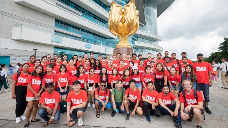TFAS Asia students on their city tour by the Golden Bauhinia Square.